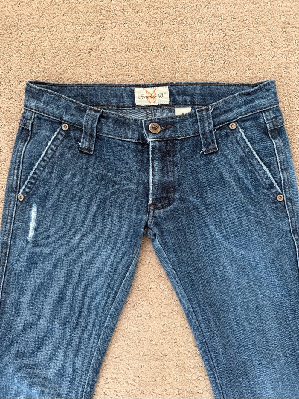 Frankie B. Low rise flare Distressed Blue Jeans